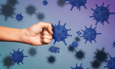 fist punching virus to symbolize immune system fighting illness