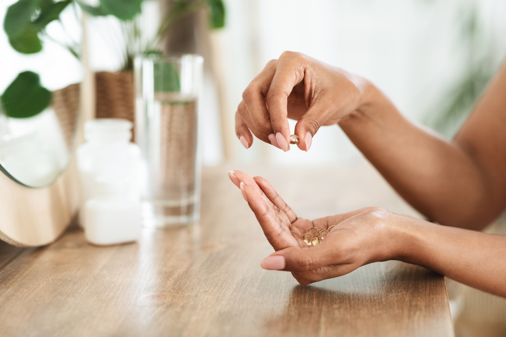 handful of omega-3 supplements for healthy skin